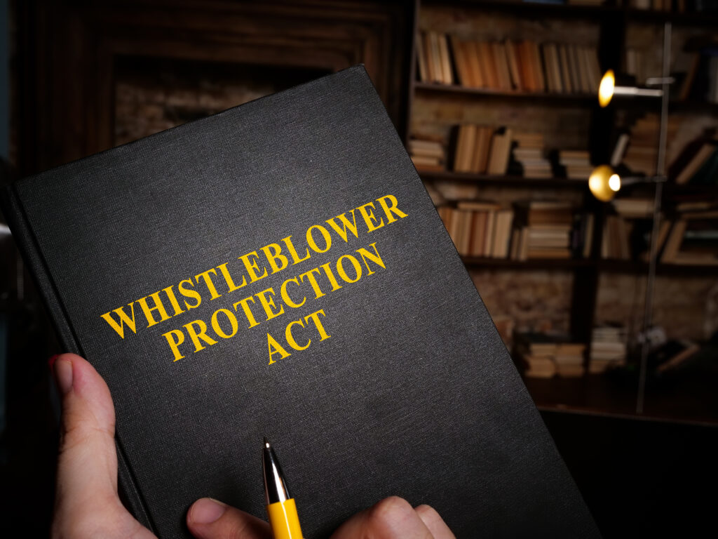 Black book labeled "Whistleblower Protection Act."